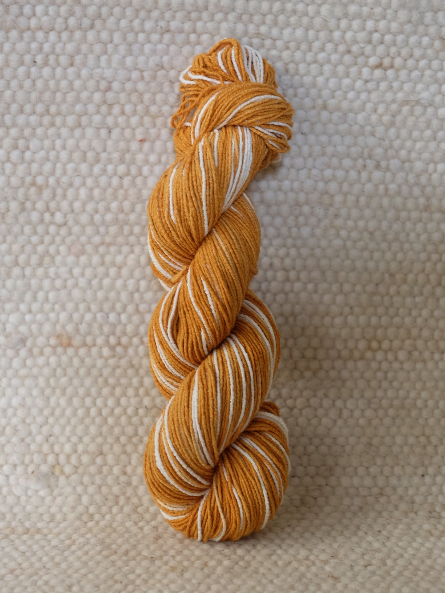 selfstriping yarn, orange white color